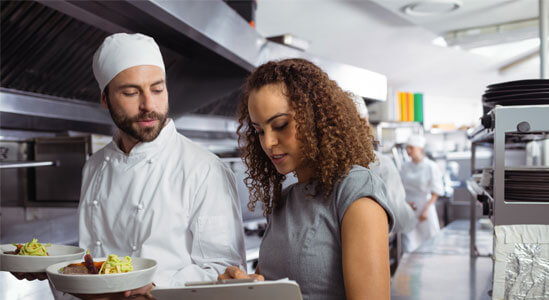 Experts discussing food in the kitchen