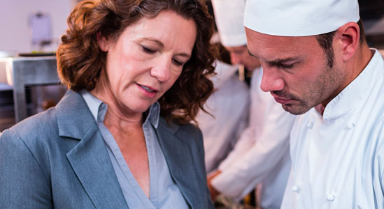 Experts discussing food in the kitchen