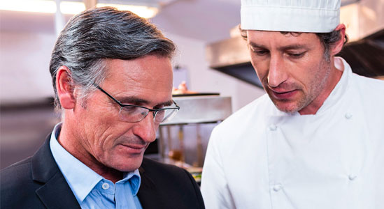 Experts discussing food in the kitchen